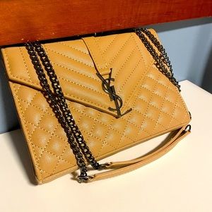 Quilted tan leather crossbody or shoulder bag with gunmetal chain detail